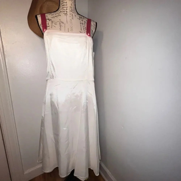 Michelle Antonelli,14 whimsical sleeveless, polkadot butterfly sequence skater - Picture 11 of 11